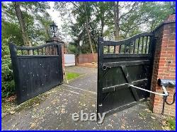 A Pair Of Wooden Electric Driveway Gates