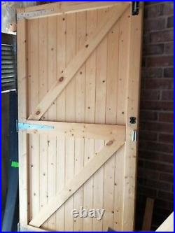 Double wooden driveway gates used indoors never been outdoors very good cond