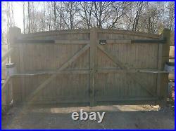 Driveway Wooden Gates c/w above ground electric arms and many remote fobs