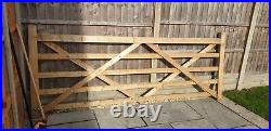 Large wooden driveway gate