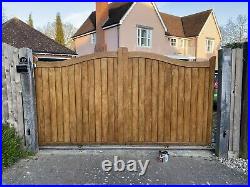 Large wooden driveway gates used