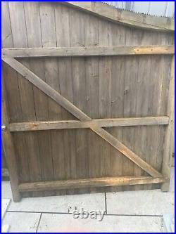 Large wooden driveway gates used