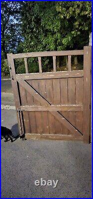 Large wooden driveway gates used