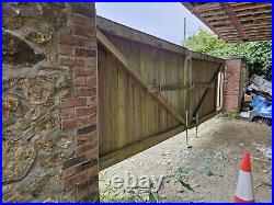 Large wooden driveway gates used