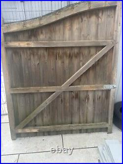 Large wooden driveway gates used