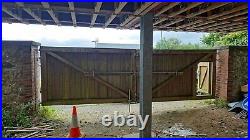 Large wooden driveway gates used