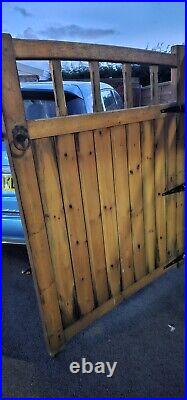 Large wooden driveway gates used