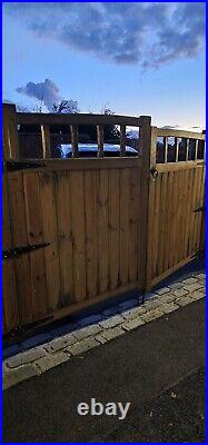 Large wooden driveway gates used