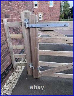 Large wooden driveway gates used