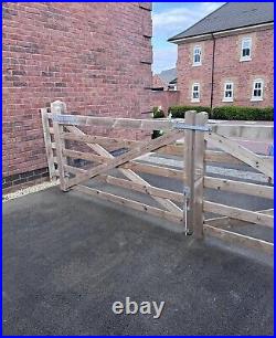 Large wooden driveway gates used