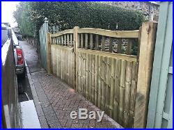 Olympic Curve Timber Entrance Gates Bespoke Wooden Driveway Gates. Treated