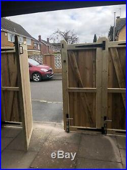 Tanalised Wooden Bi-folding Driveway gates 14ft wide X 6ft high