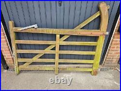 Used, 2 pairs of 5 bar wooden field gates, each gate 6ft wide, with ironmongery