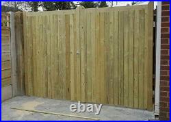 WOODEN TANALISED PAIR OF DRIVEWAY GATE'S WITH IRONMONGERY (grahamxbrown)