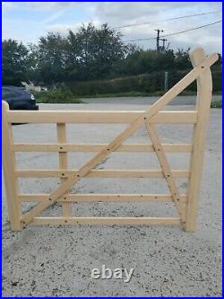 Wooden entrance farm drive gate
